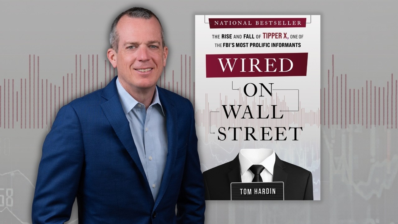 Author Tom Hardin next to his book Wired on Wall Street