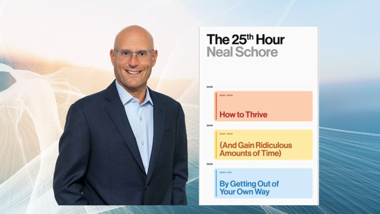 Neal Schore with his book THE 25TH HOUR: How to Thrive (And Gain Ridiculous Amounts of Time) By Getting Out of Your Own Way