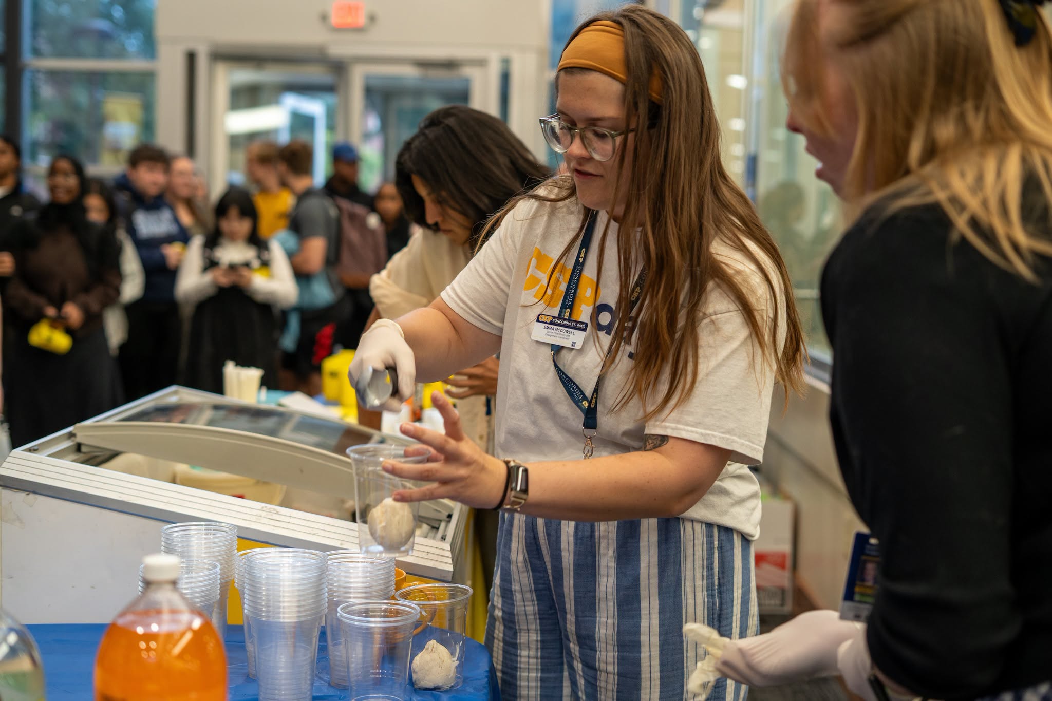 Staff member scooping ice cream