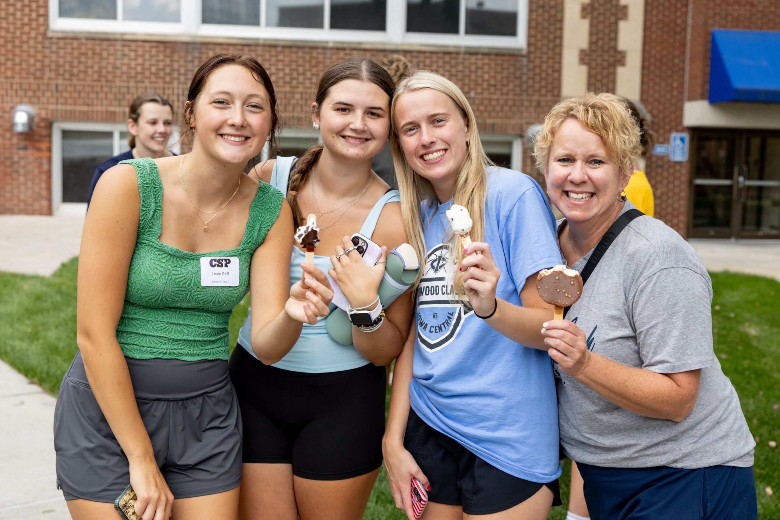 Three students and a mom with dilly bars